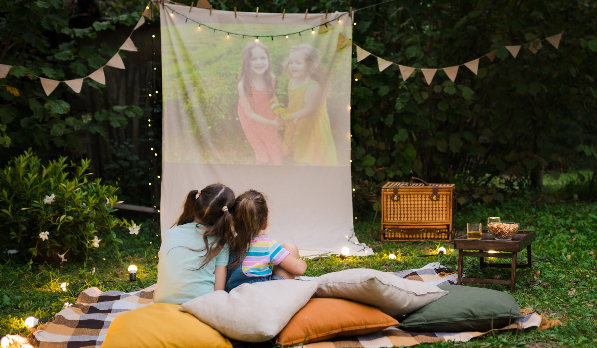 Backyard Family outdoor movie night with kids. Outdoor Movie Night Summer Staycation